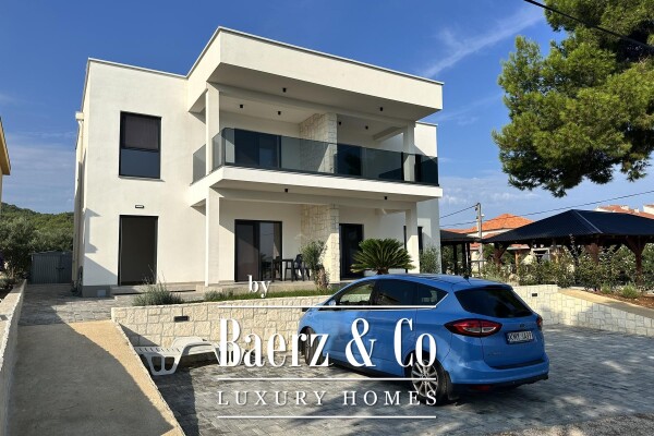 photo 1 Pašman, Neviđane, modern house in a new building with four separate apartments, first row by the...