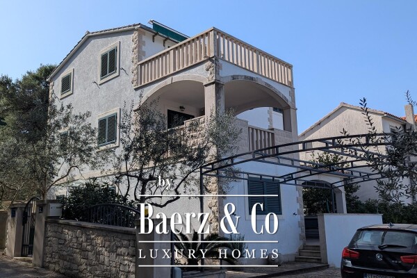 photo 1 Brač, Supetar, a house with a total area of 372 m² located on a plot of 411 m².