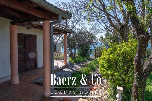 photo 1 Zadar, Karma, house with garden in an excellent location, first row to the sea, 111 m2