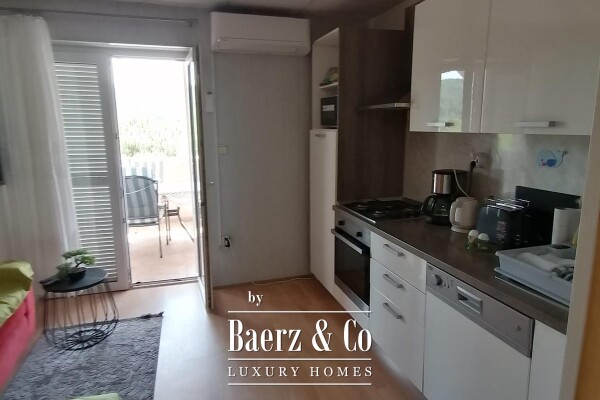 photo 2 Rab, Lopar, multi-purpose house with commercial and residential units in an attractive location